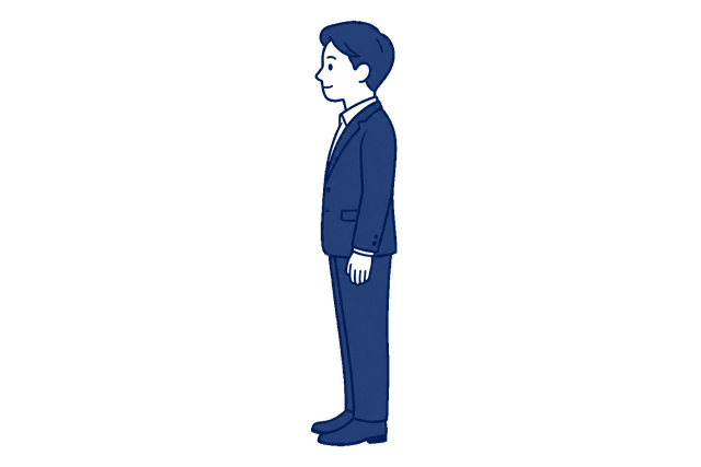 紺色のスーツ姿の男性が、真横を向いて背筋を伸ばして立っている全身のイラスト。